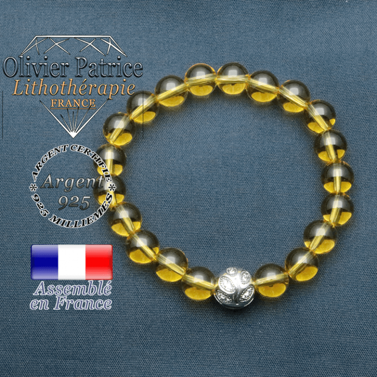Bracelet surmonté de sa boule gravée de feuilles en argent 925 en pierre naturelle en citrine