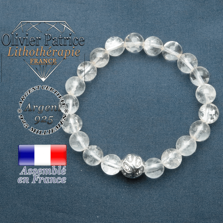 Bracelet surmonté de sa boule gravée de feuilles en argent 925 en pierre naturelle en cristal-roche