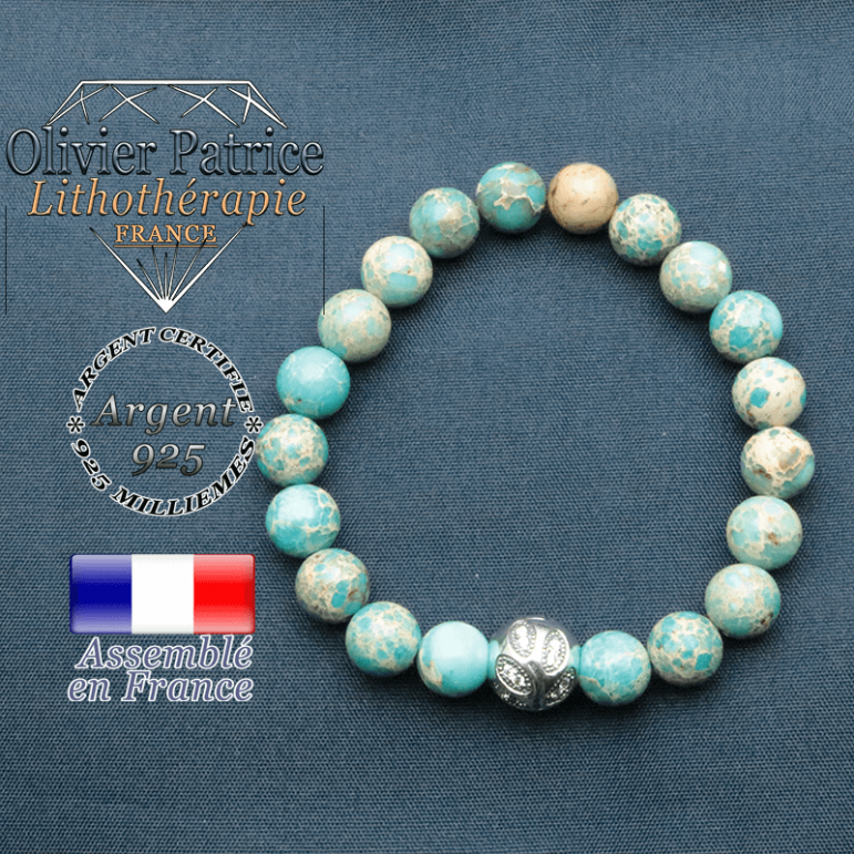 Bracelet surmonté de sa boule gravée de feuilles en argent 925 en pierre naturelle en agate dentelle