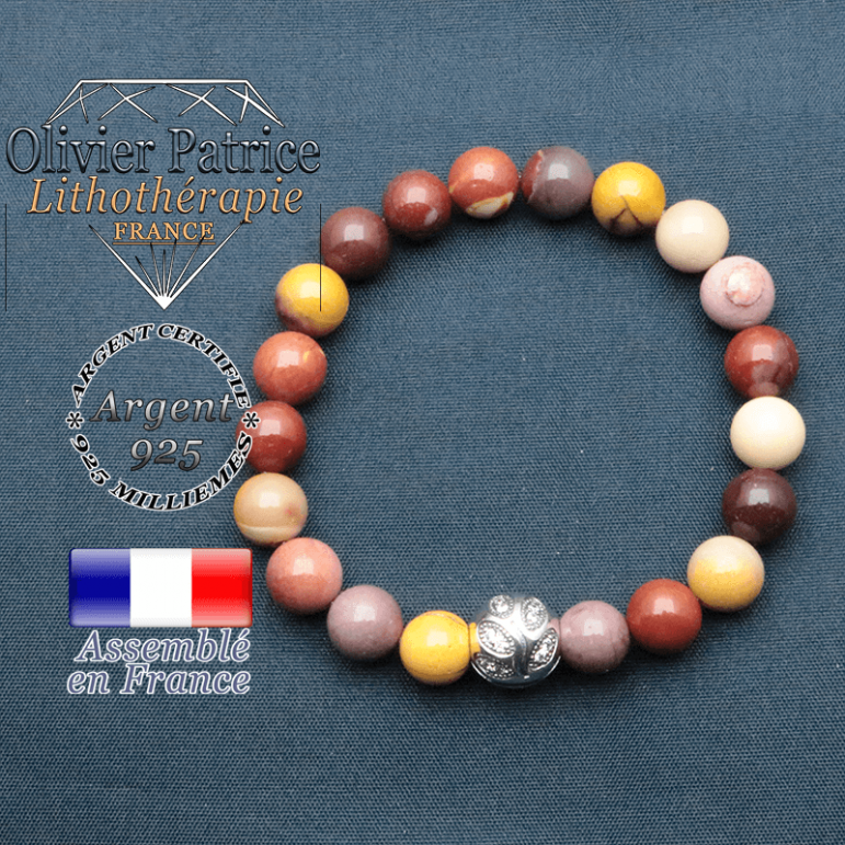 Bracelet surmonté de sa boule gravée de feuilles en argent 925 en pierre naturelle en jaspe mokaite