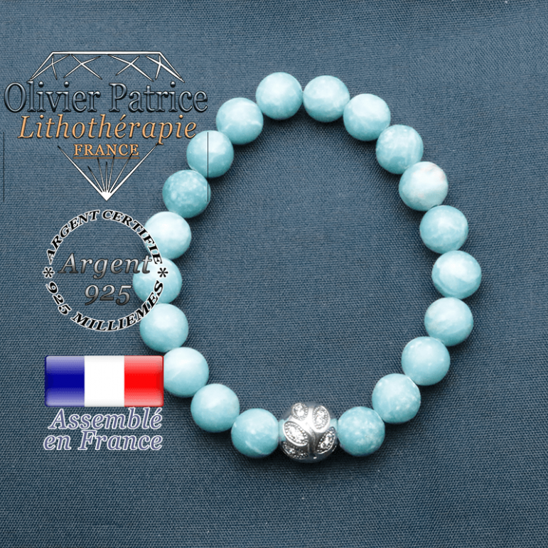 Bracelet surmonté de sa boule gravée de feuilles en argent 925 en pierre naturelle en larimar