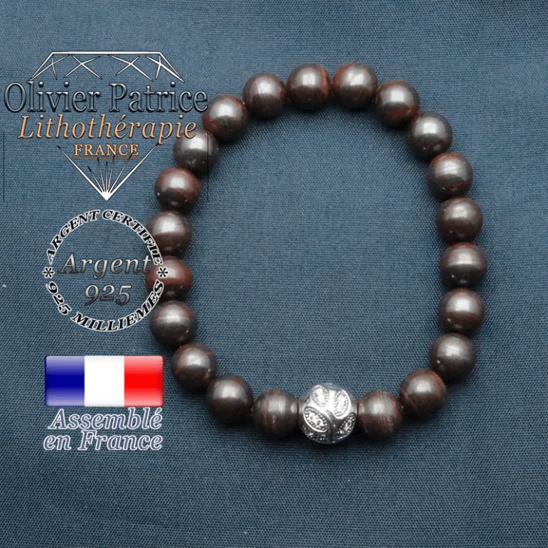 Bracelet surmonté de sa boule gravée de feuilles en argent 925 en pierre naturelle en oeil de fer
