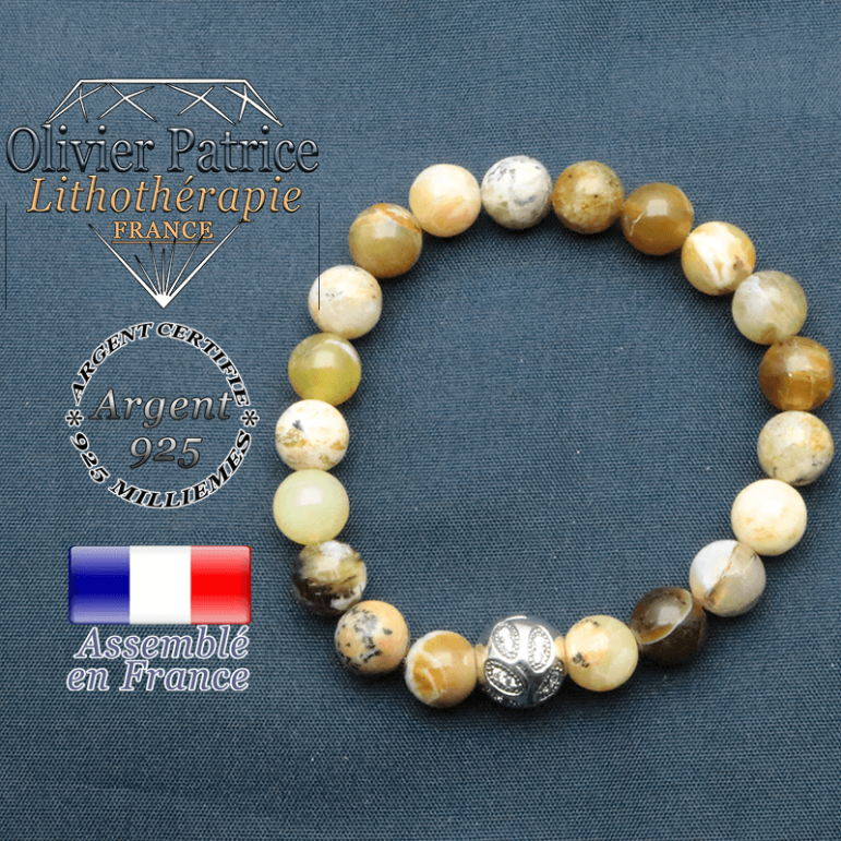 Bracelet surmonté de sa boule gravée de feuilles en argent 925 en pierre naturelle en opale jaune africaine