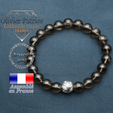 Bracelet surmonté de sa boule gravée de feuilles en argent 925 en pierre naturelle en quartz fume