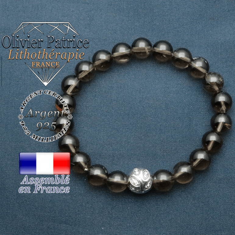 Bracelet surmonté de sa boule gravée de feuilles en argent 925 en pierre naturelle en quartz fume