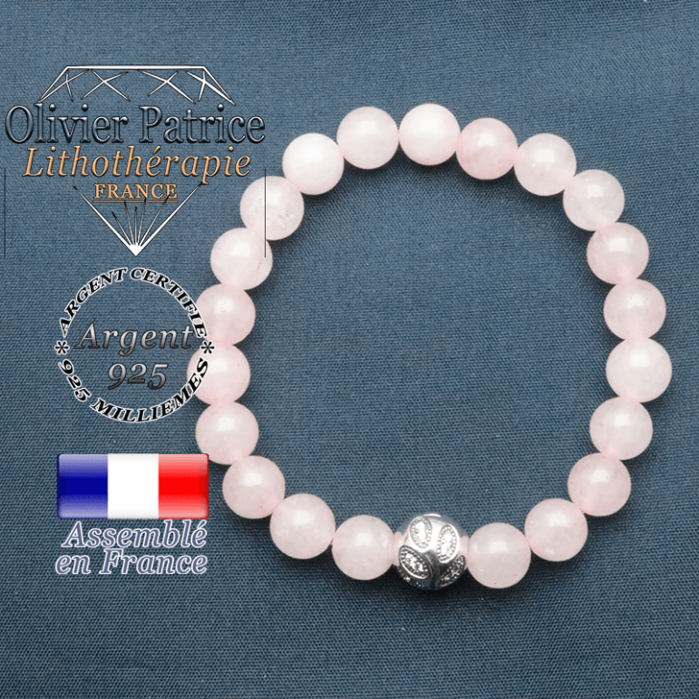 Bracelet surmonté de sa boule gravée de feuilles en argent 925 en pierre naturelle en quartz rose