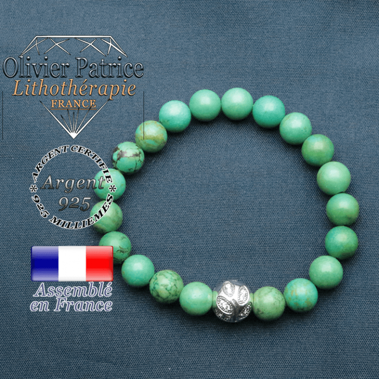 Bracelet surmonté de sa boule gravée de feuilles en argent 925 en pierre naturelle en turquoise tibet