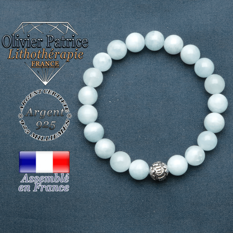 bracelet en pierre naturelle en aigue marine et sa boule de finition om mani en argent 925