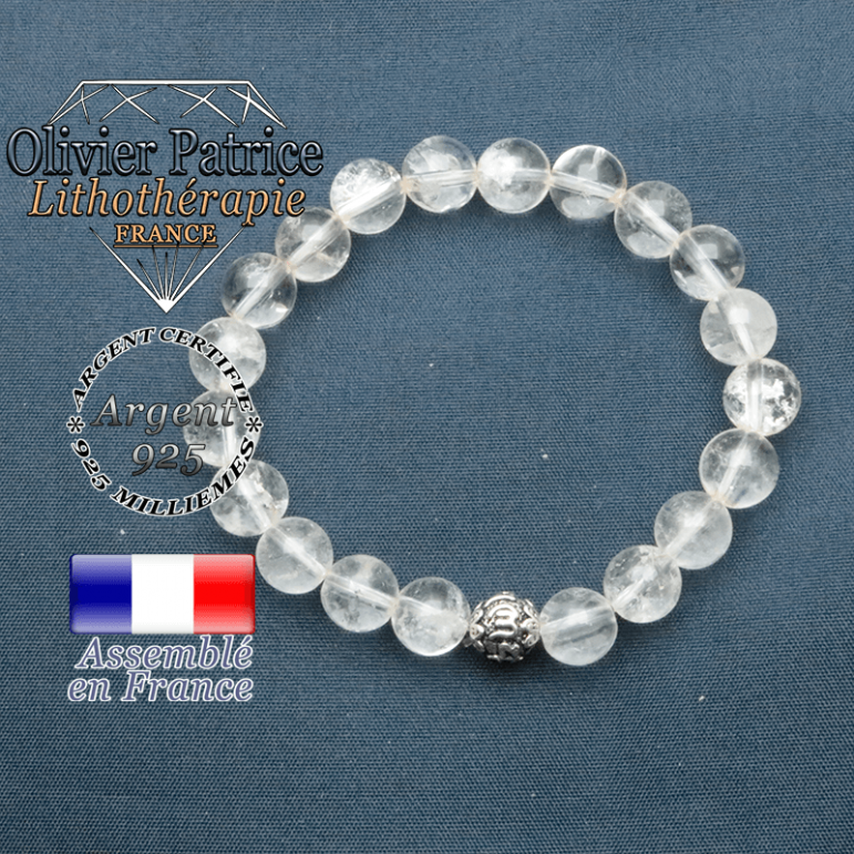 bracelet en pierre naturelle en cristal de roche et sa boule de finition om mani en argent plaqué