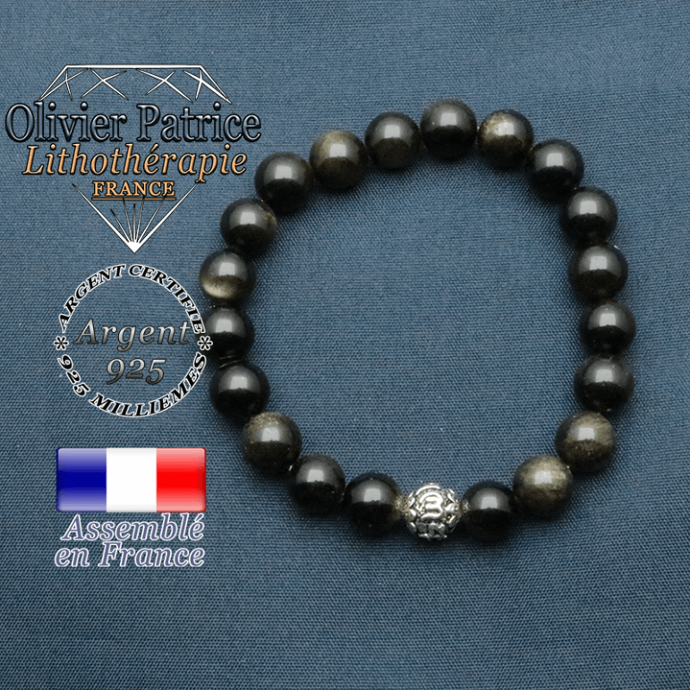 bracelet en pierre naturelle en obsidienne dore et sa boule de finition om mani en argent plaqué