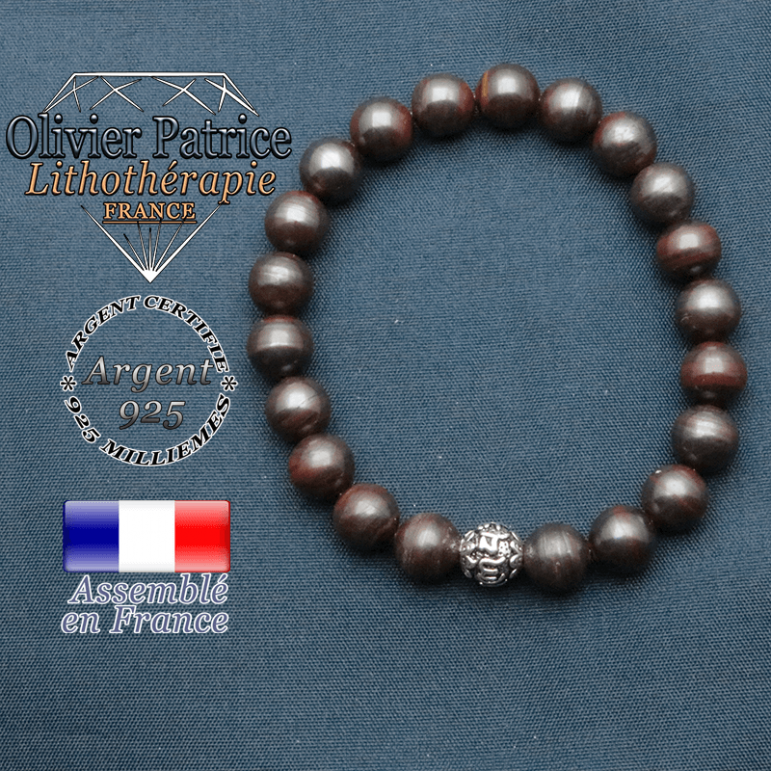 bracelet en pierre naturelle en oeil de fer et sa boule de finition om mani en argent plaqué