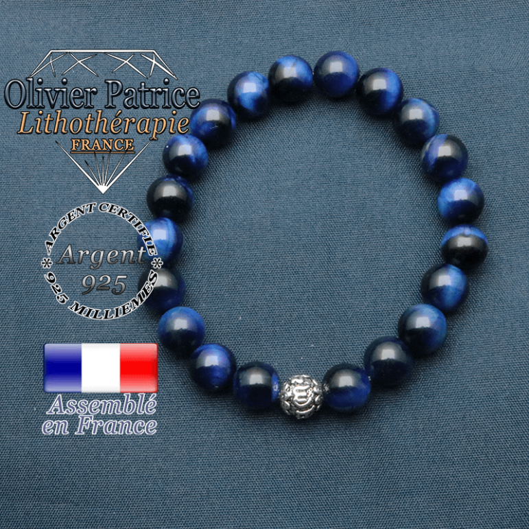 bracelet en pierre naturelle en oeil de tigre teinte bleu et sa boule de finition om mani en argent plaqué