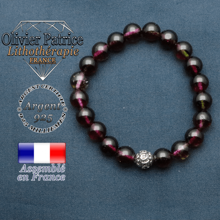 bracelet en pierre naturelle en tourmaline melon d'eau et sa boule de finition om mani en argent plaqué