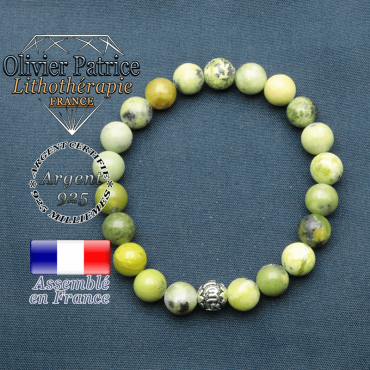 bracelet en pierre naturelle en turquoise africaine et sa boule de finition om mani en argent plaqué