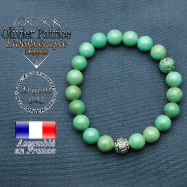 bracelet en pierre naturelle en turquoise du tibet et sa boule de finition om mani en argent plaqué