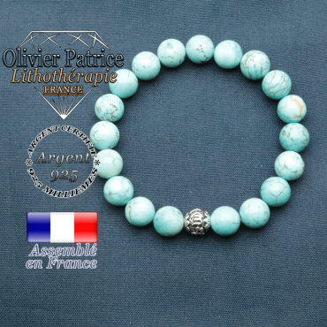 bracelet en pierre naturelle en turquoise et sa boule de finition om mani en argent plaqué