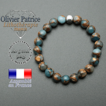bracelet en pierre naturelle et sa finition boule lisse en argent 925 sa pierre est en bornite