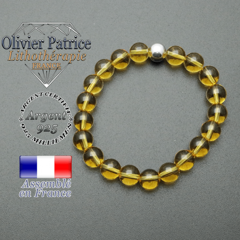 bracelet en pierre naturelle et sa finition boule lisse en argent 925 sa pierre est en citrine