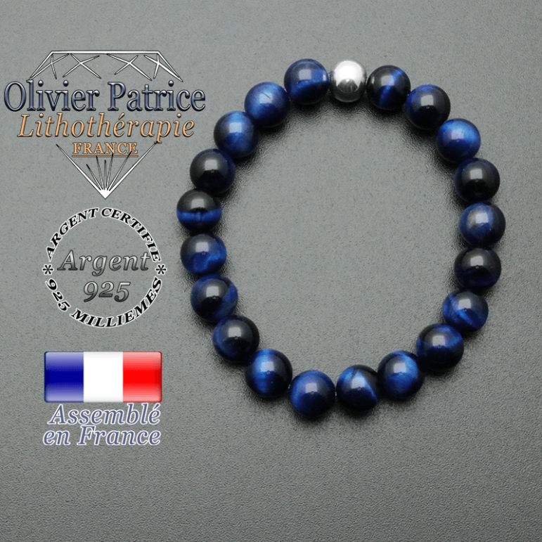 bracelet en pierre naturelle et sa finition boule lisse en argent 925 sa pierre est en oeil de tigre teinte bleue
