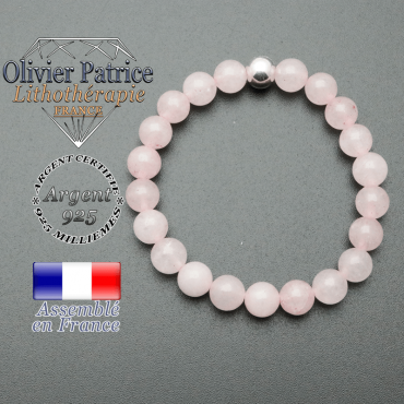 bracelet en pierre naturelle et sa finition boule lisse en argent 925 sa pierre est en quartz rose