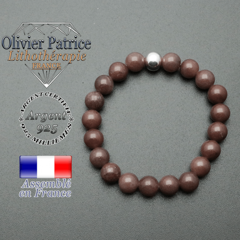 bracelet en pierre naturelle et sa finition boule lisse en argent 925 sa pierre est en quartz vin