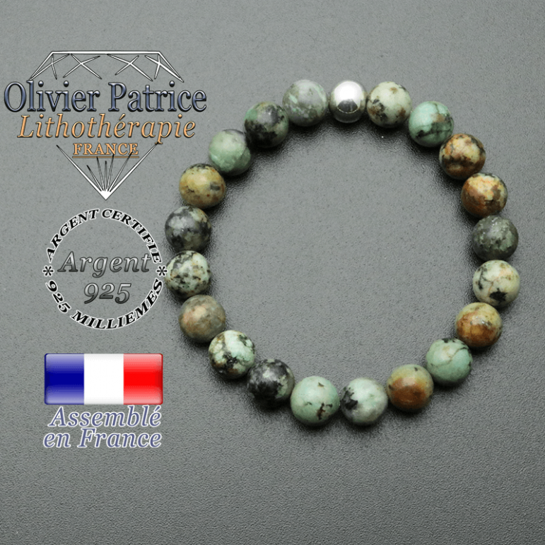 bracelet en pierre naturelle et sa finition boule lisse en argent 925 sa pierre est en turquoise bleue africaine