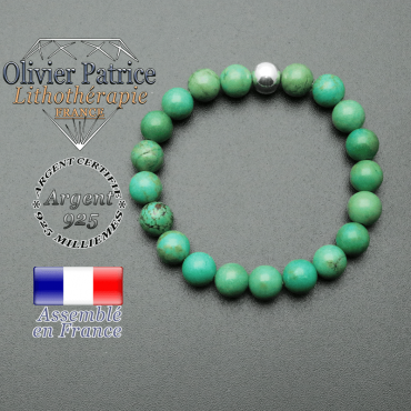 bracelet en pierre naturelle et sa finition boule lisse en argent 925 sa pierre est en turquoise du tibet