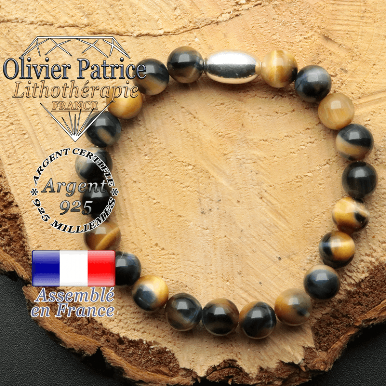 bracelet en pierre naturelle et son appret olive en argent 925 sa pierre est de l'oeil de faucon