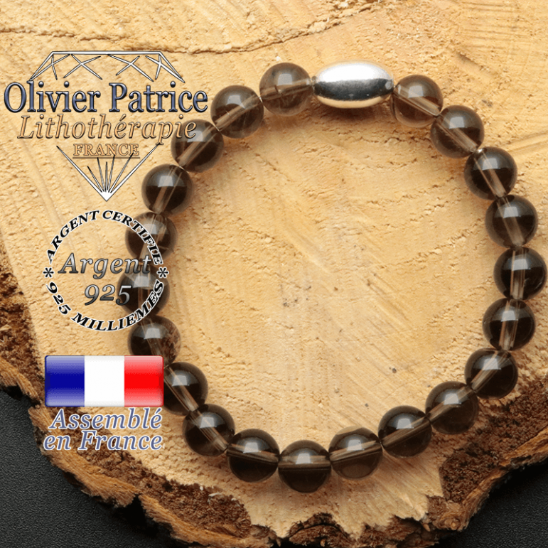 bracelet en pierre naturelle et son appret olive en argent 925 sa pierre est du quartz fume