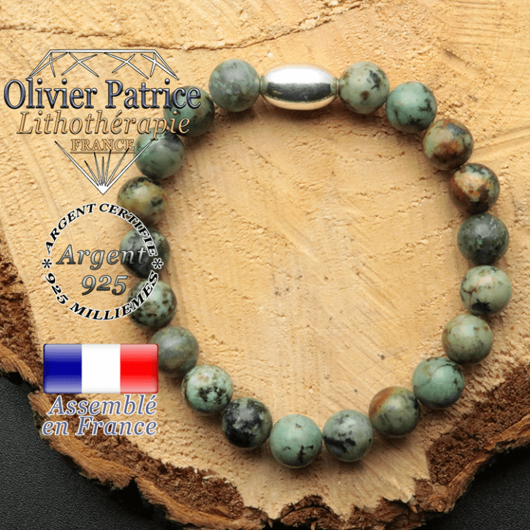 bracelet en pierre naturelle et son appret olive en argent 925 sa pierre est de la turquoise bleue africaine