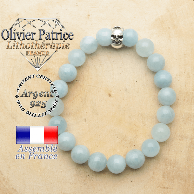 bracelet tete de mort avec sa pierre naturelle en aigue marine