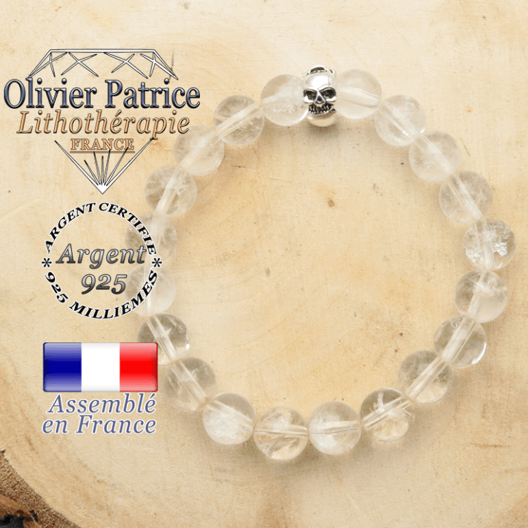 bracelet tete de mort avec sa pierre naturelle en cristal de roche