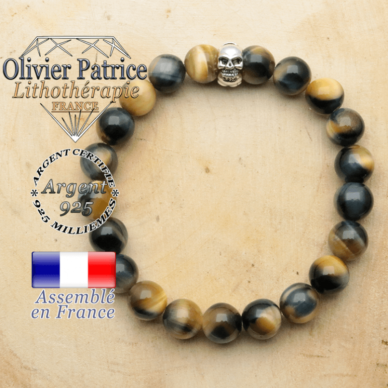bracelet tete de mort avec sa pierre naturelle en oeil de faucon