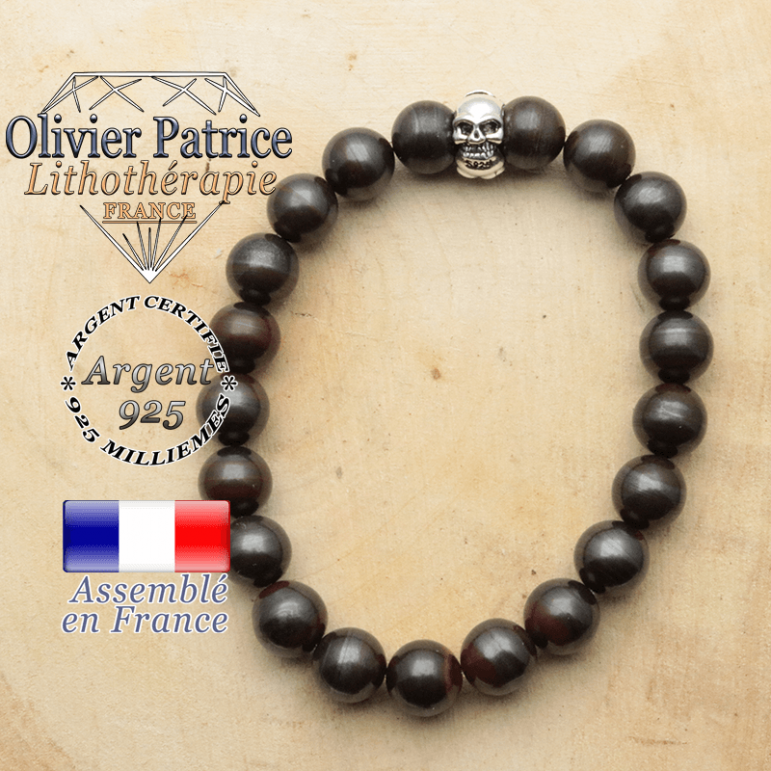 bracelet tete de mort avec sa pierre naturelle en oeil de fer