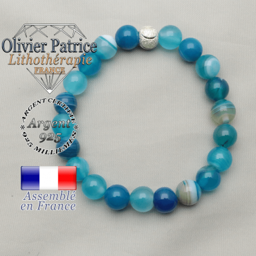 Bracelet naturel en argent 925 fini avec une boule strass symbole des JO monté en agate bleue à bandes
