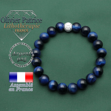 Oeil de tigre teinte bleu monté sur un bracelet strass argent 925 avec anneaux jeux olympiques