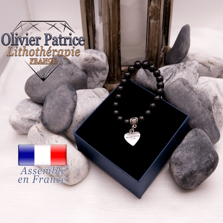 Bracelet en onyx et son charms coeur en alliage
