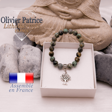 Bracelet turquoise bleue africaine et son charms arbre de vie alliage