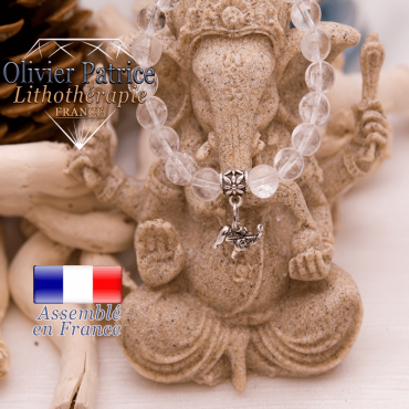 Bracelet cristal de roche et son charms éléphant en alliage