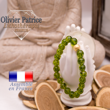 Bracelet péridot et sa boule plaqué or