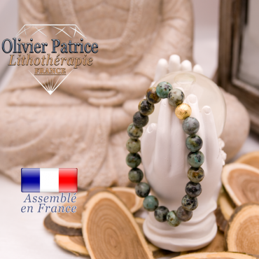 Bracelet turquoise bleue africaine et sa boule plaqué or