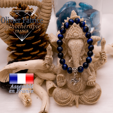 Bracelet Œil de Tigre teinte bleue et son charms éléphant en alliage