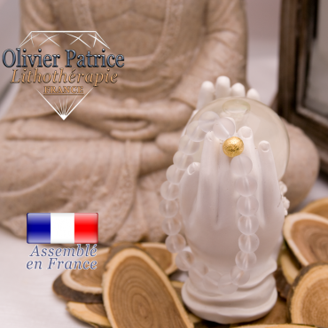 Bracelet cristal de roche opaque et sa boule plaqué or