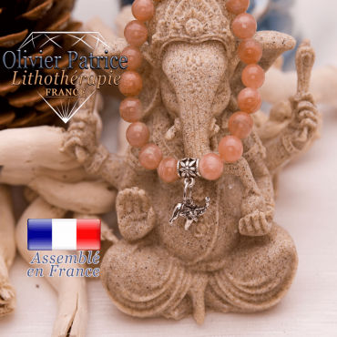 Bracelet pierre de soleil et son charms éléphant en alliage