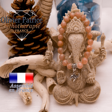 Bracelet pierre de soleil et son charms éléphant en alliage