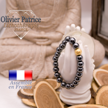 Bracelet en hématite et boule plaqué or