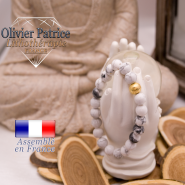 Bracelet howlite et sa boule plaqué or