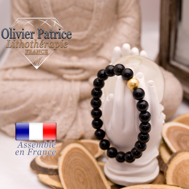 Bracelet onyx et sa boule plaqué or