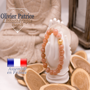 Bracelet pierre de soleil et sa boule plaqué or