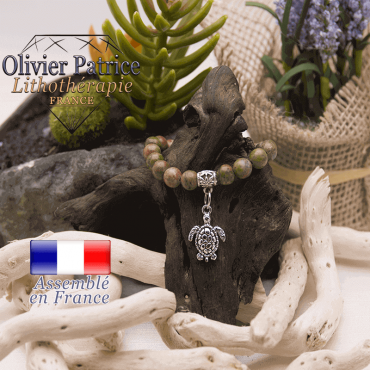 Bracelet unakite et son charms tortue en alliage